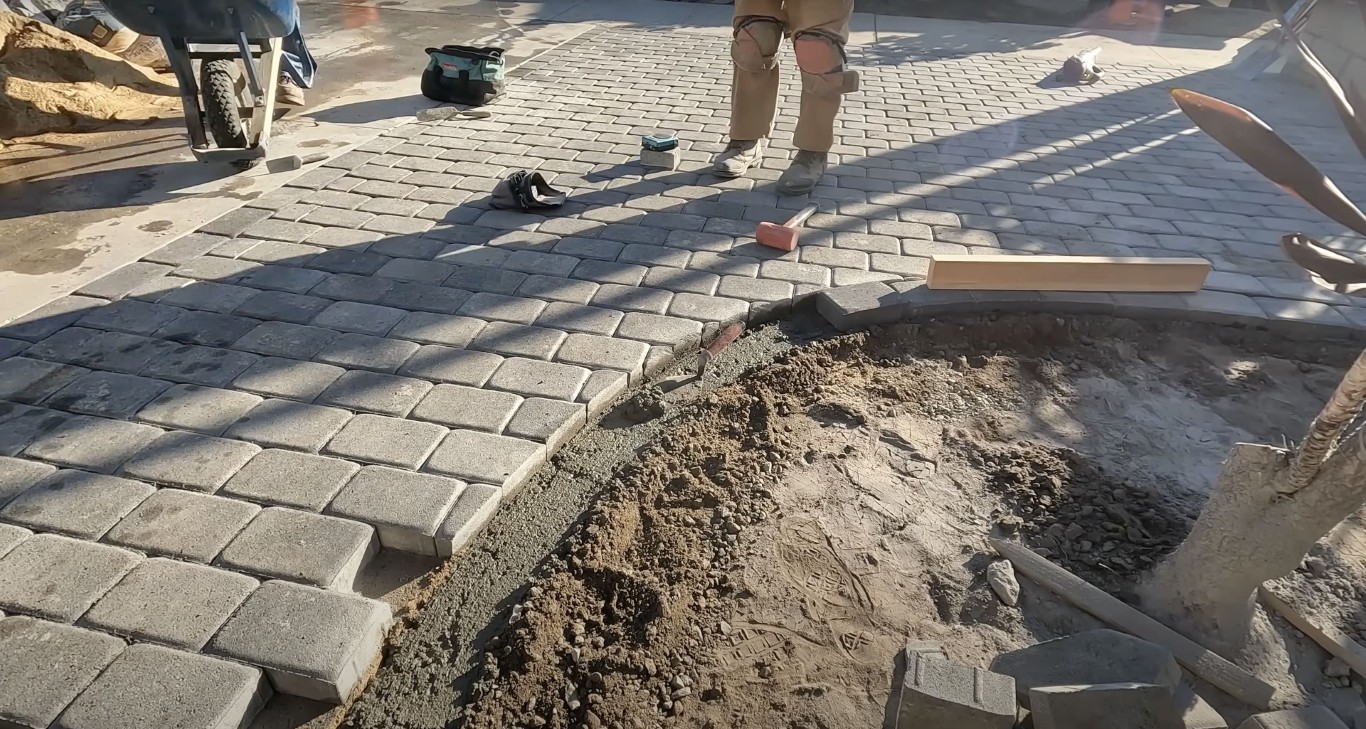 Decorative paver installation work in progress at residential property in Henderson, KY