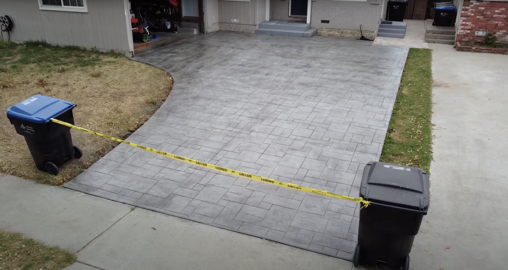 Stamped concrete patio with decorative pattern by Henderson Concrete Pros Beautiful stamped concrete patio installation with geometric pattern design in Henderson, KY
