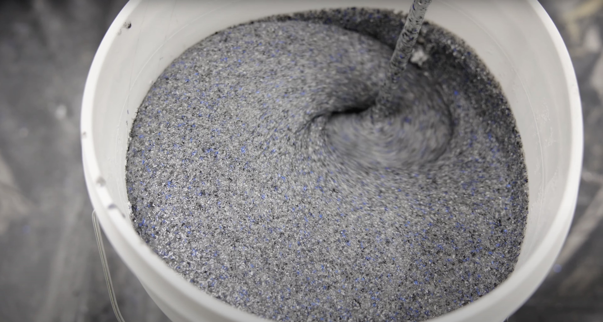 Professional concrete preparation and mixing Quality concrete mixing process showing attention to material preparation