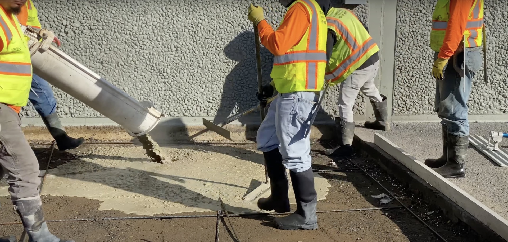 Our experienced team handling commercial concrete installation Henderson Concrete Pros team working on large commercial concrete project